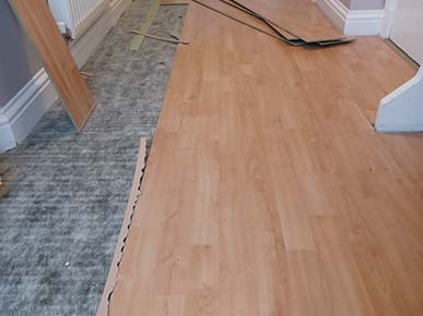 Multi-trade Property Improvements: Laminate Flooring